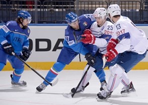MINSK, BELARUS - MAY 11: Italy's Thomas Larkin #27 battles for position with France's Nicolas Ritz #25 during preliminary round action at the 2014 IIHF Ice Hockey World Championship. (Photo by Richard Wolowicz/HHOF-IIHF Images)