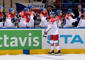 MINSK, BELARUS - MAY 12: Czech Republic's Roman Cervenka #10 celebrates with the bench after scoring Team Czech Republic's first goal of the game during preliminary round action at the 2014 IIHF Ice Hockey World Championship. (Photo by Richard Wolowicz/HHOF-IIHF Images)