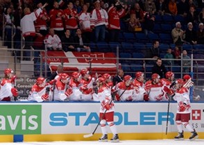 MINSK, BELARUS - MAY 13: Denmark's Jesper Jensen #40 high fives the bench after scoring Team Denmark's first goal of the game during preliminary round action at the 2014 IIHF Ice Hockey World Championship. (Photo by Richard Wolowicz/HHOF-IIHF Images)

