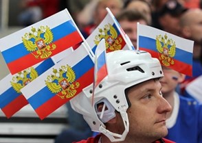 MINSK, BELARUS - MAY 24: A Russian cheering on his team during semifinal round action against Sweden at the 2014 IIHF Ice Hockey World Championship. (Photo by Andre Ringuette/HHOF-IIHF Images)
